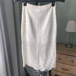 BCBG white lace pencil skirt. Never worn. Size 2